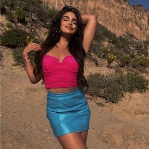 Revolve blue leather mini skirt. Brand: L’academie